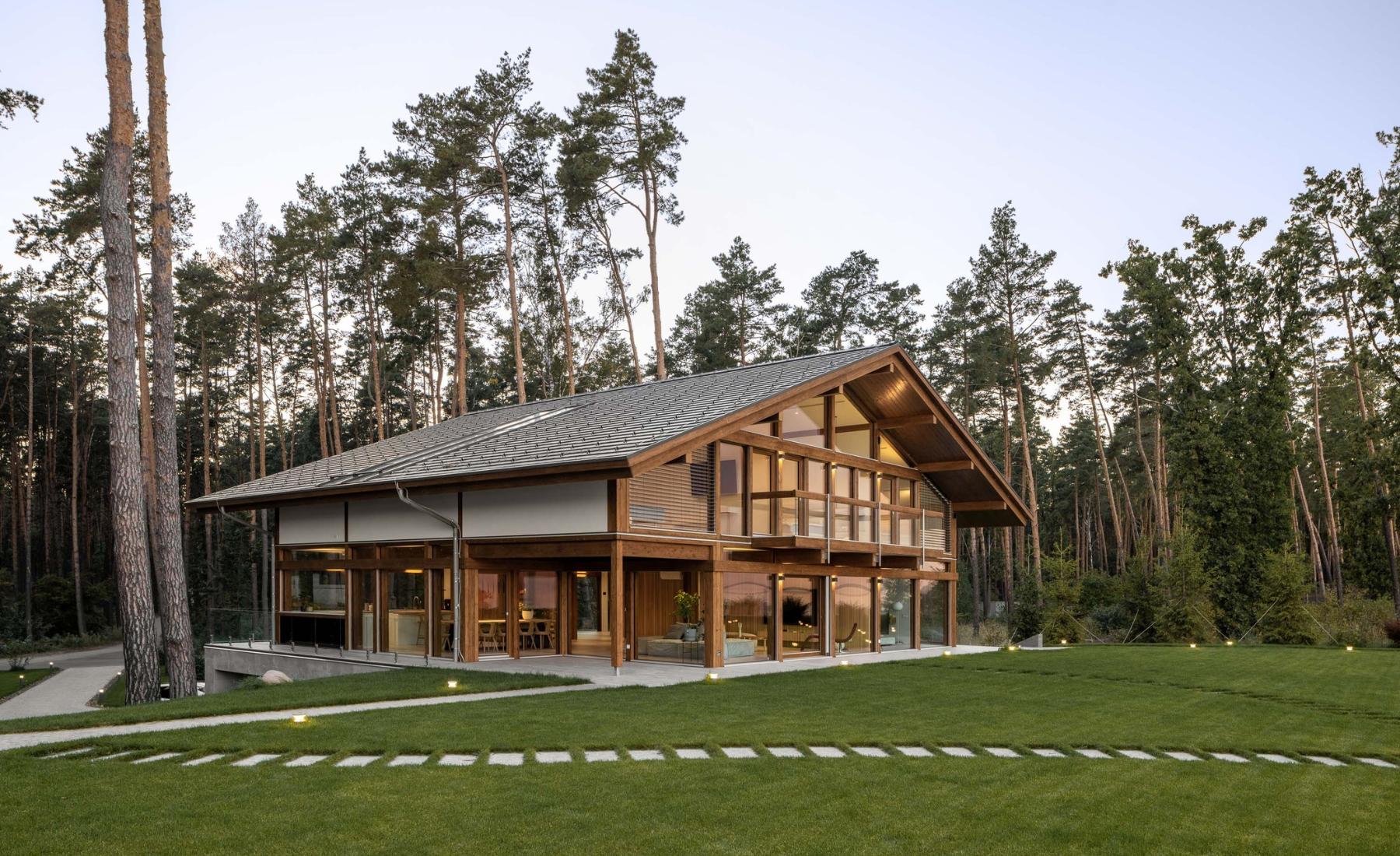 Timber-and-glass villa beside the lake