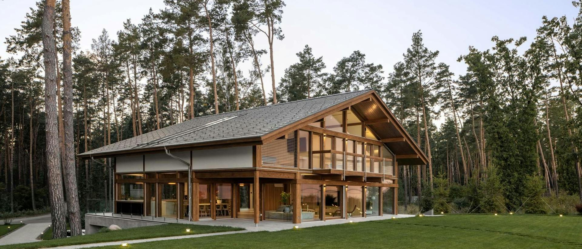 Timber-and-glass villa beside the lake