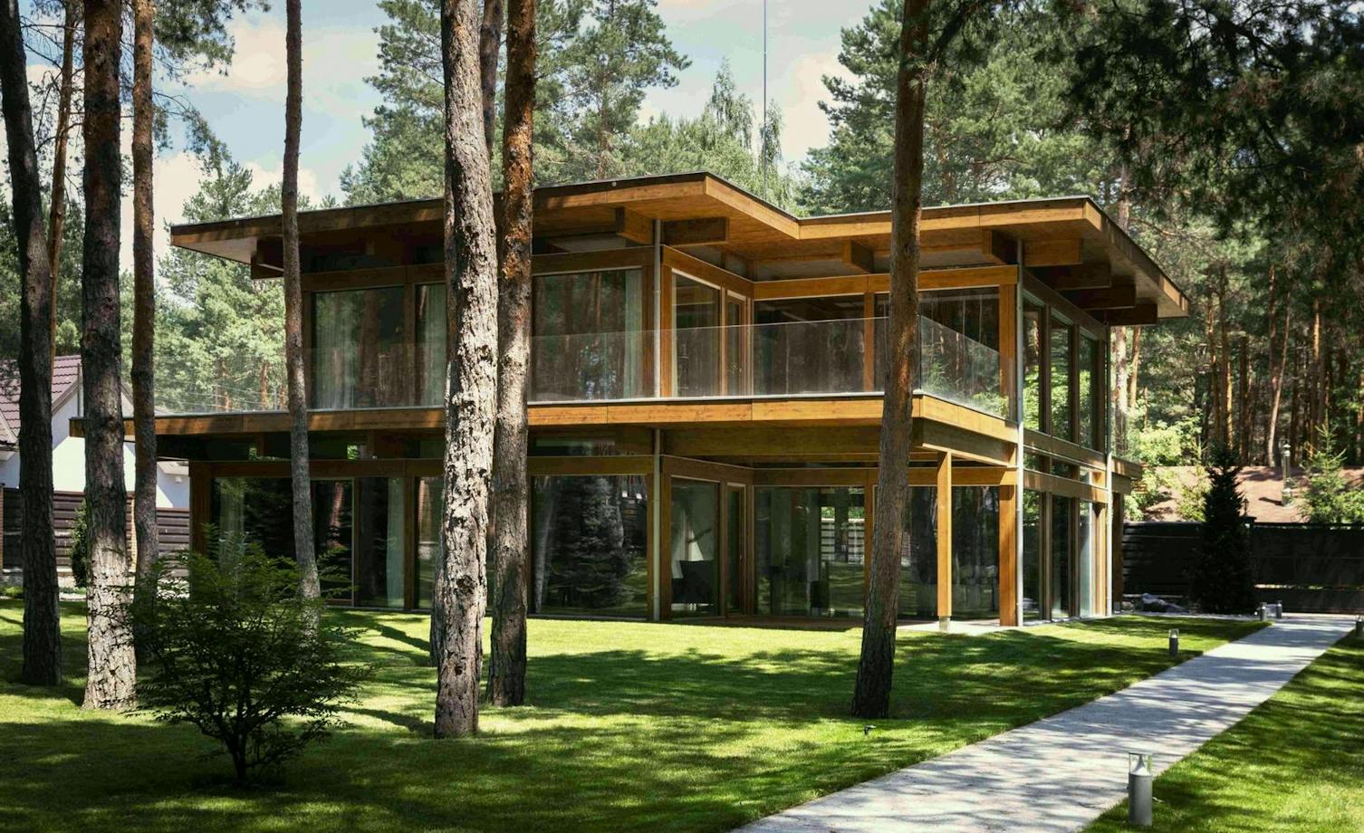 Timber-and-glass villa with a flat roof