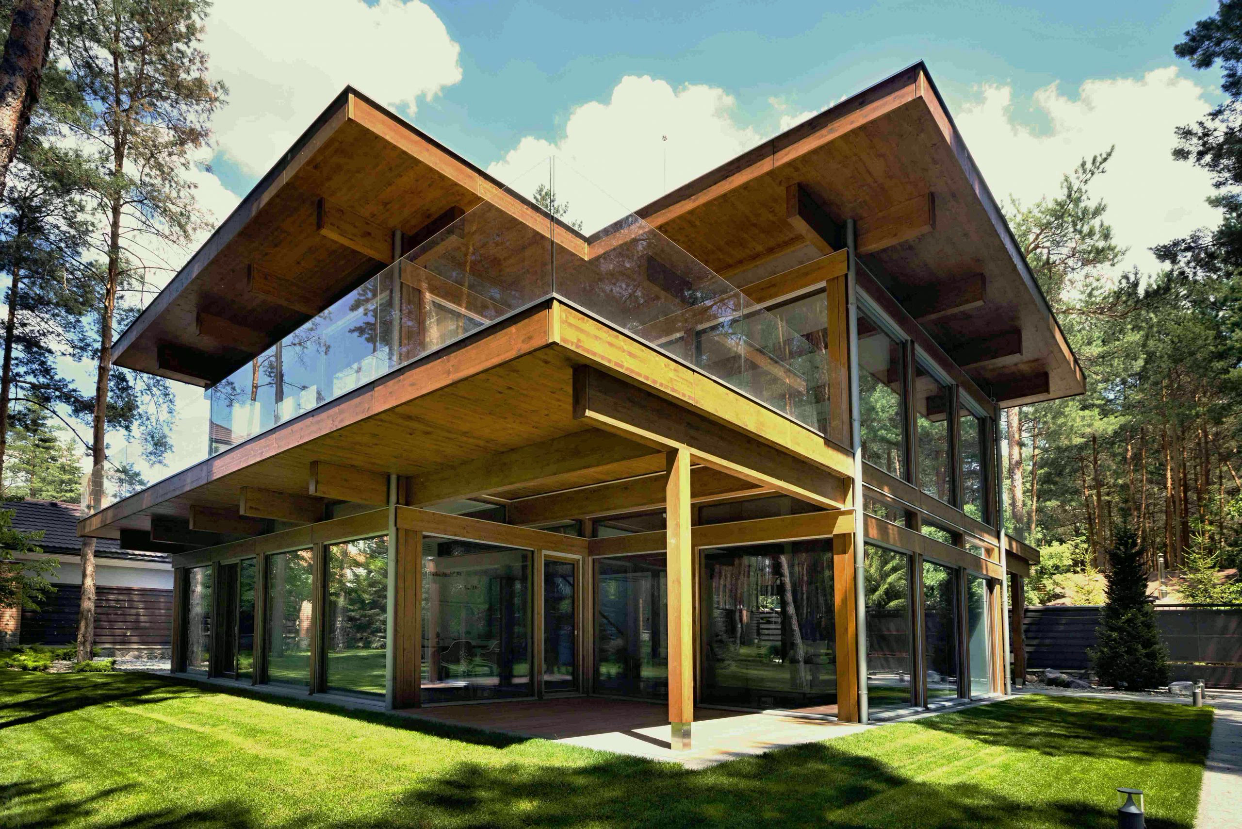 Timber-and-glass villa beside the forest