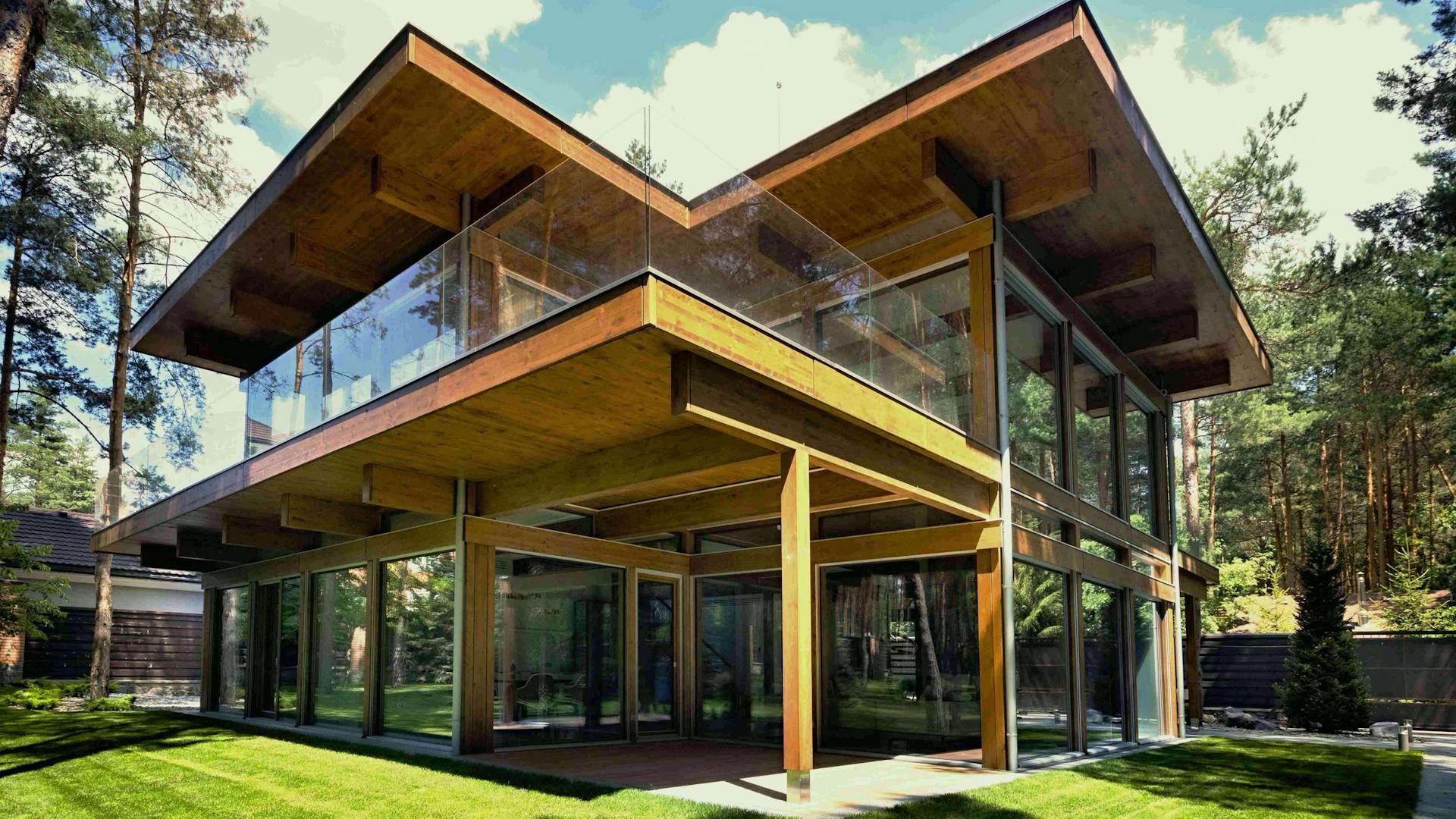 Timber-and-glass villa beside the forest