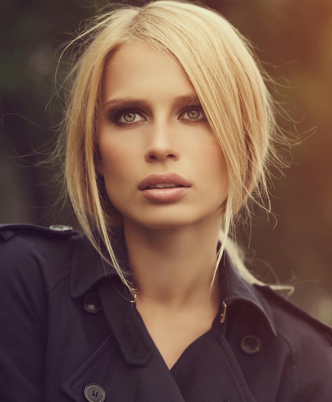 Woman with serious expression while looking off into distance