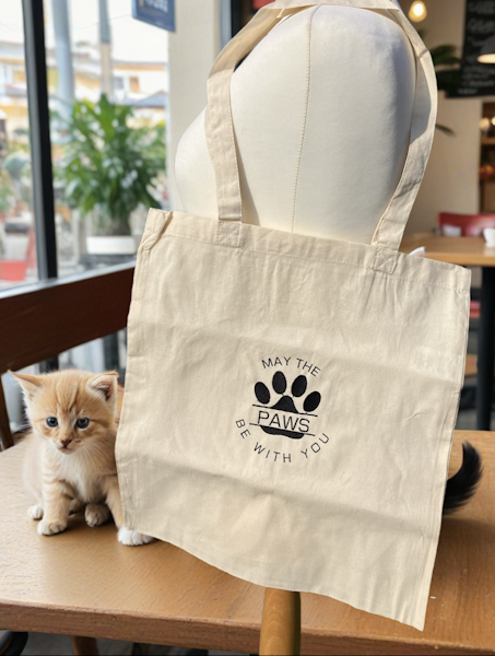 Tote bag with the slogan May the Paws Be With You