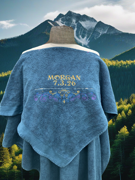Embroidered towel with a name and date of baptism