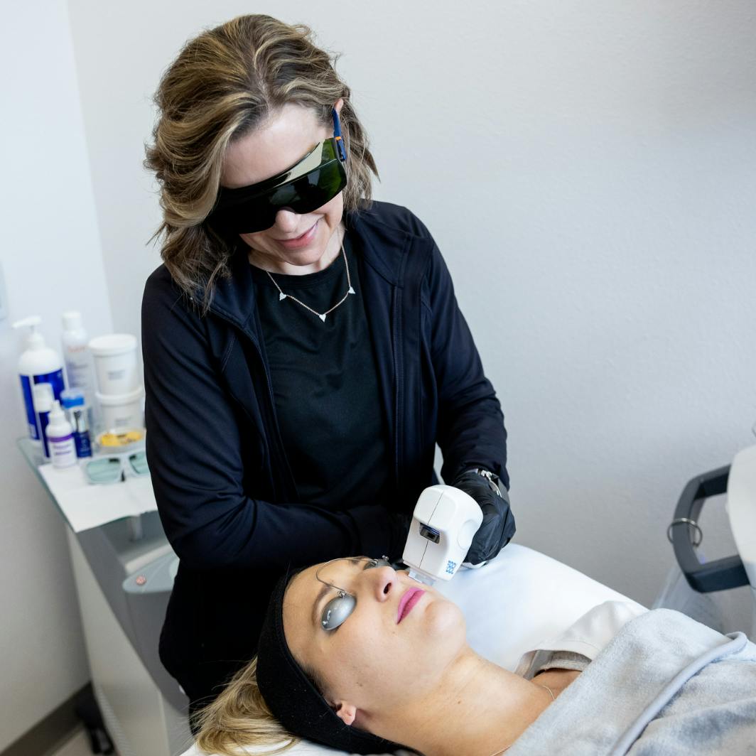 Woman doing facial rejuvenation