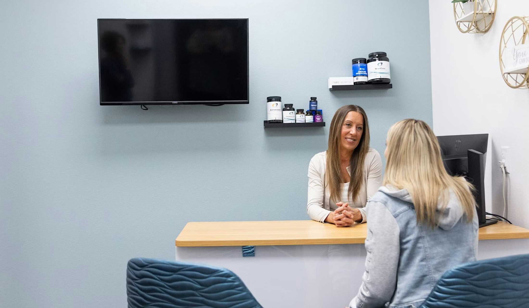 Eleve staff working with a patient