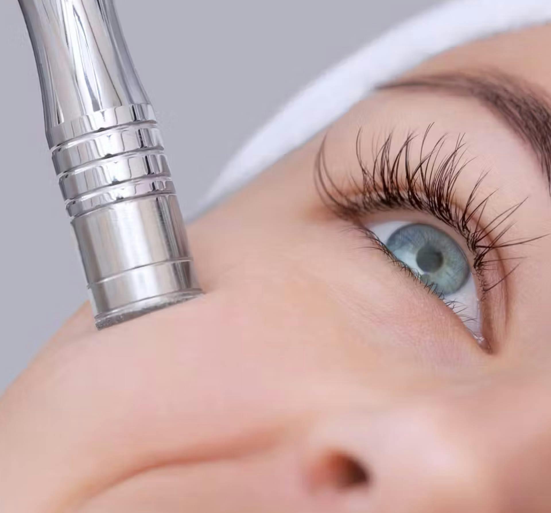 Woman getting a treatment on her cheek