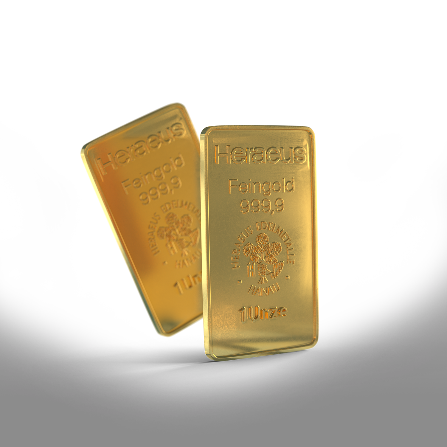 Zwei Goldbarren, der eine schweb leicht schräg hinter den anderen hervor. Sparen Sie jetzt in Gold mit den Sparplänen oder Einmalanlagen von Golden Gates.