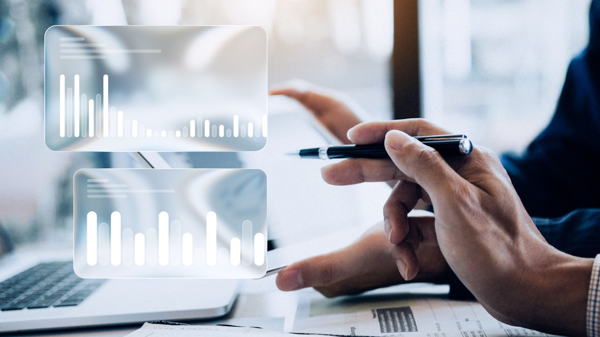 People looking at tablet. Charts.