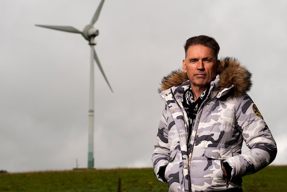 Dale Vince by windmill