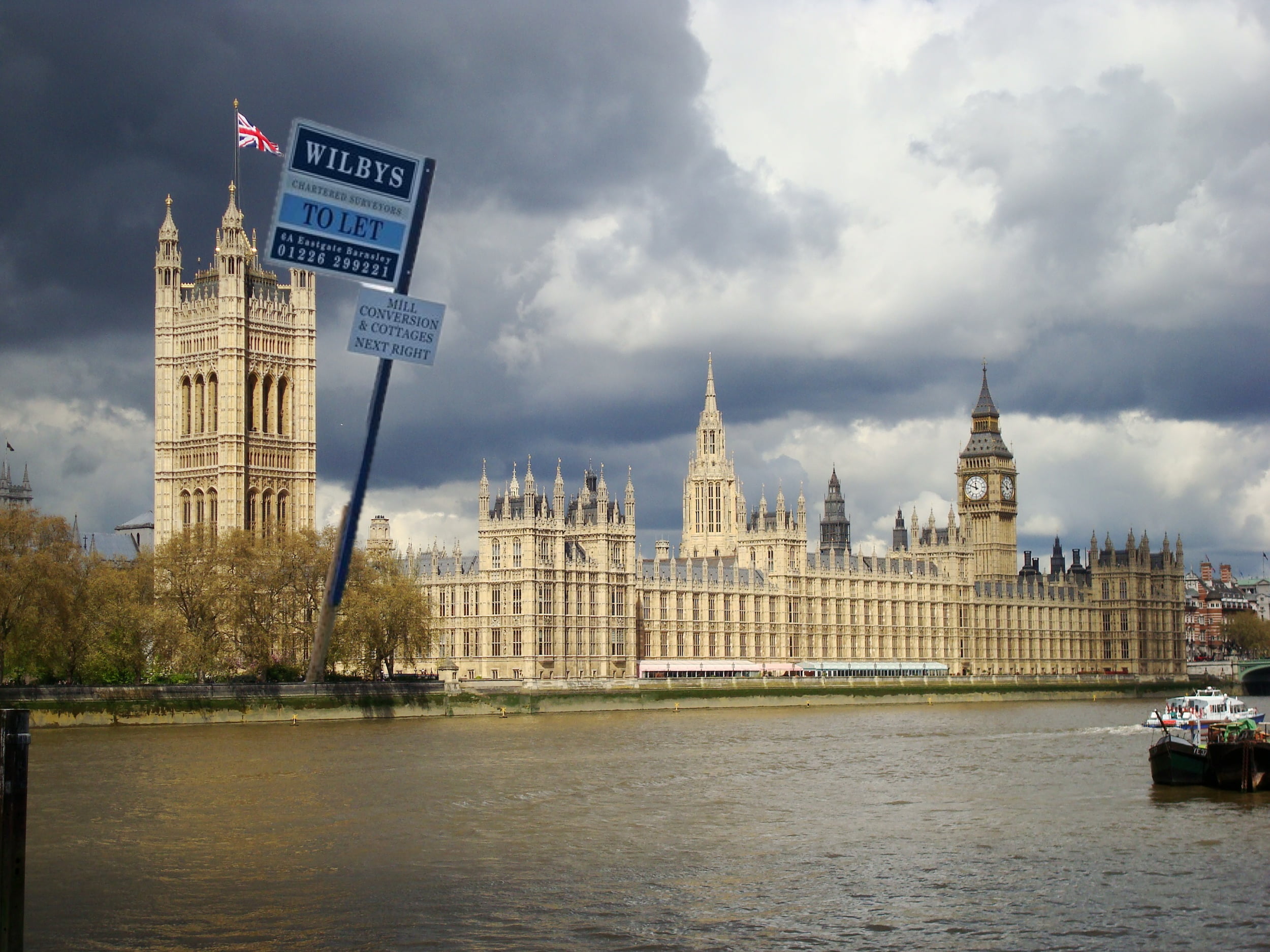 Houses of parliment with to let sign in front