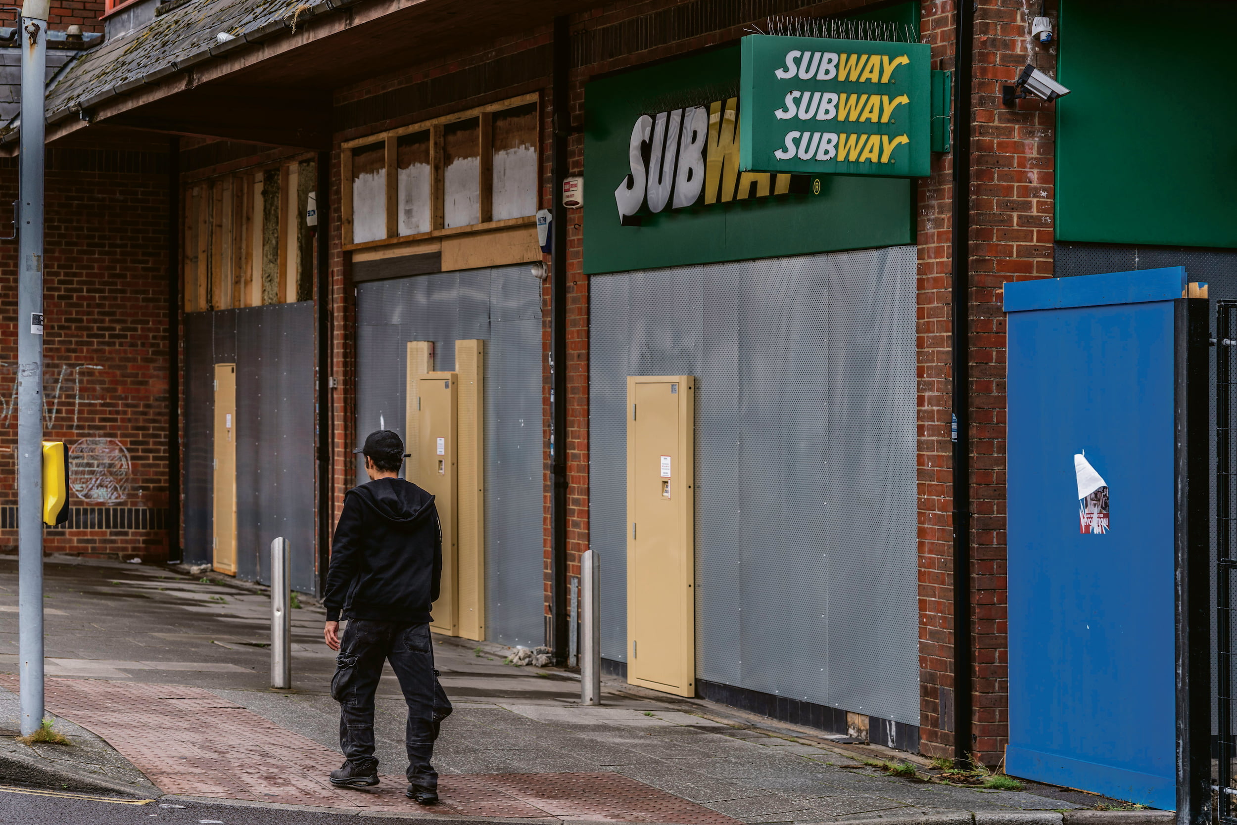 boarded up shops