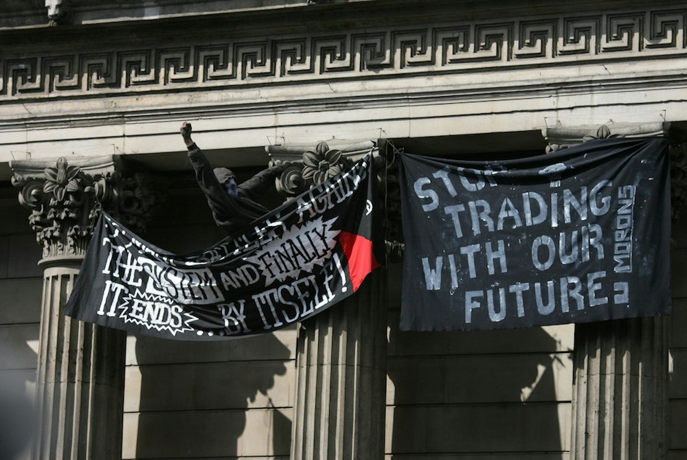 G20 protestor banners on the bank of England