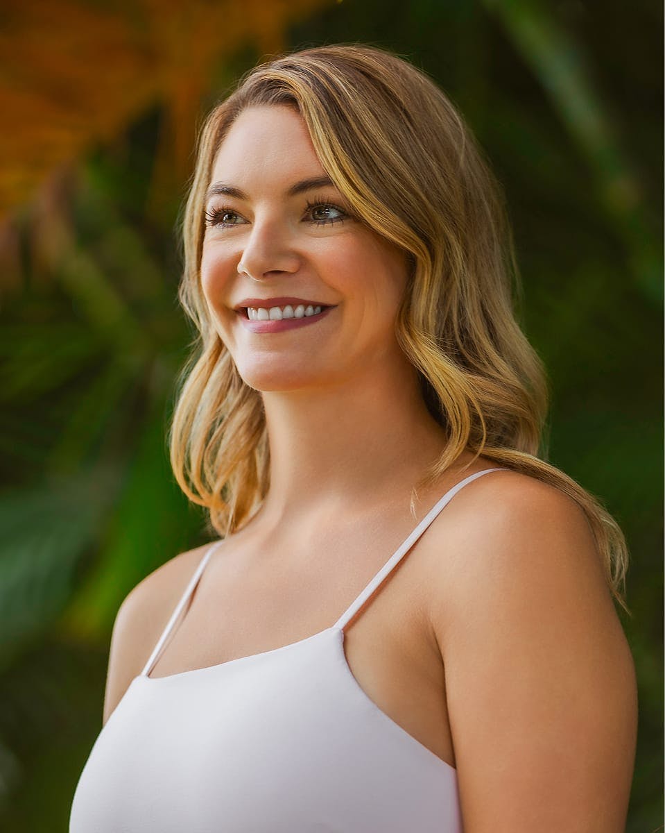 woman with blonde hair smiling