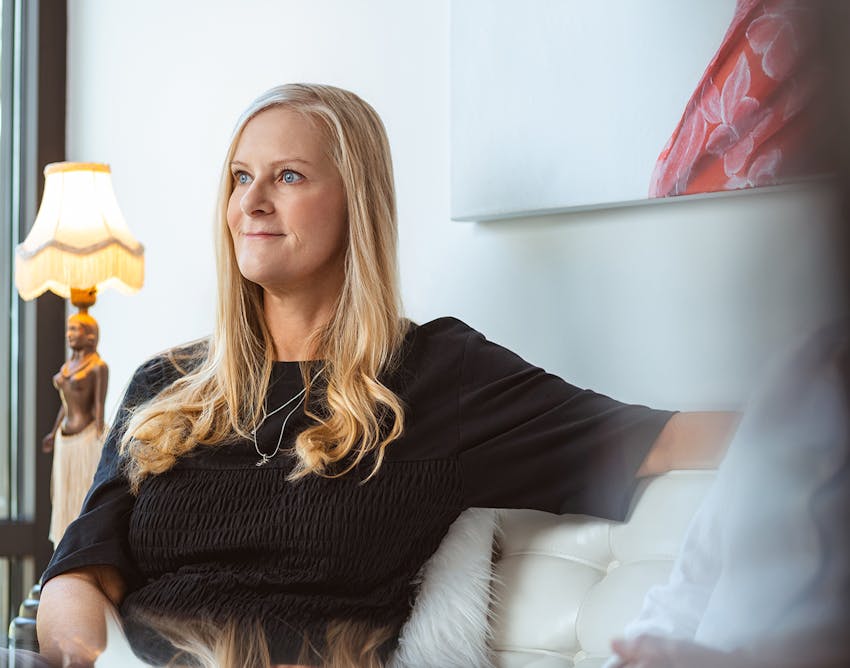 Woman sitting on a couch