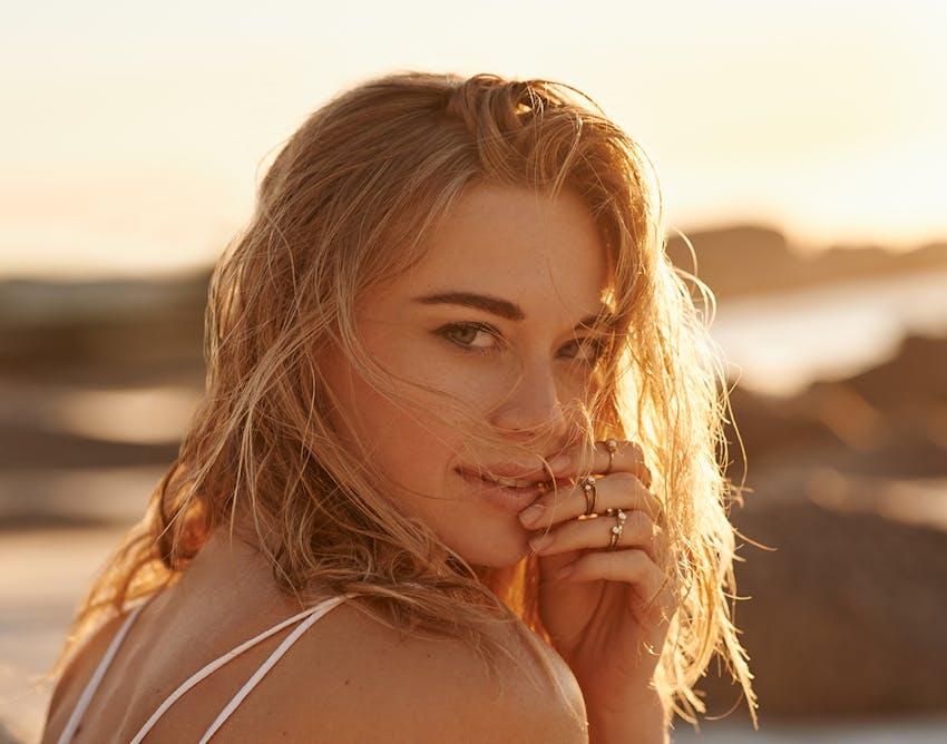 Woman looking over her shoulder