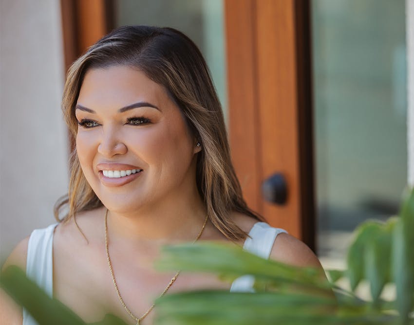 Woman Smiling and looking off to the side