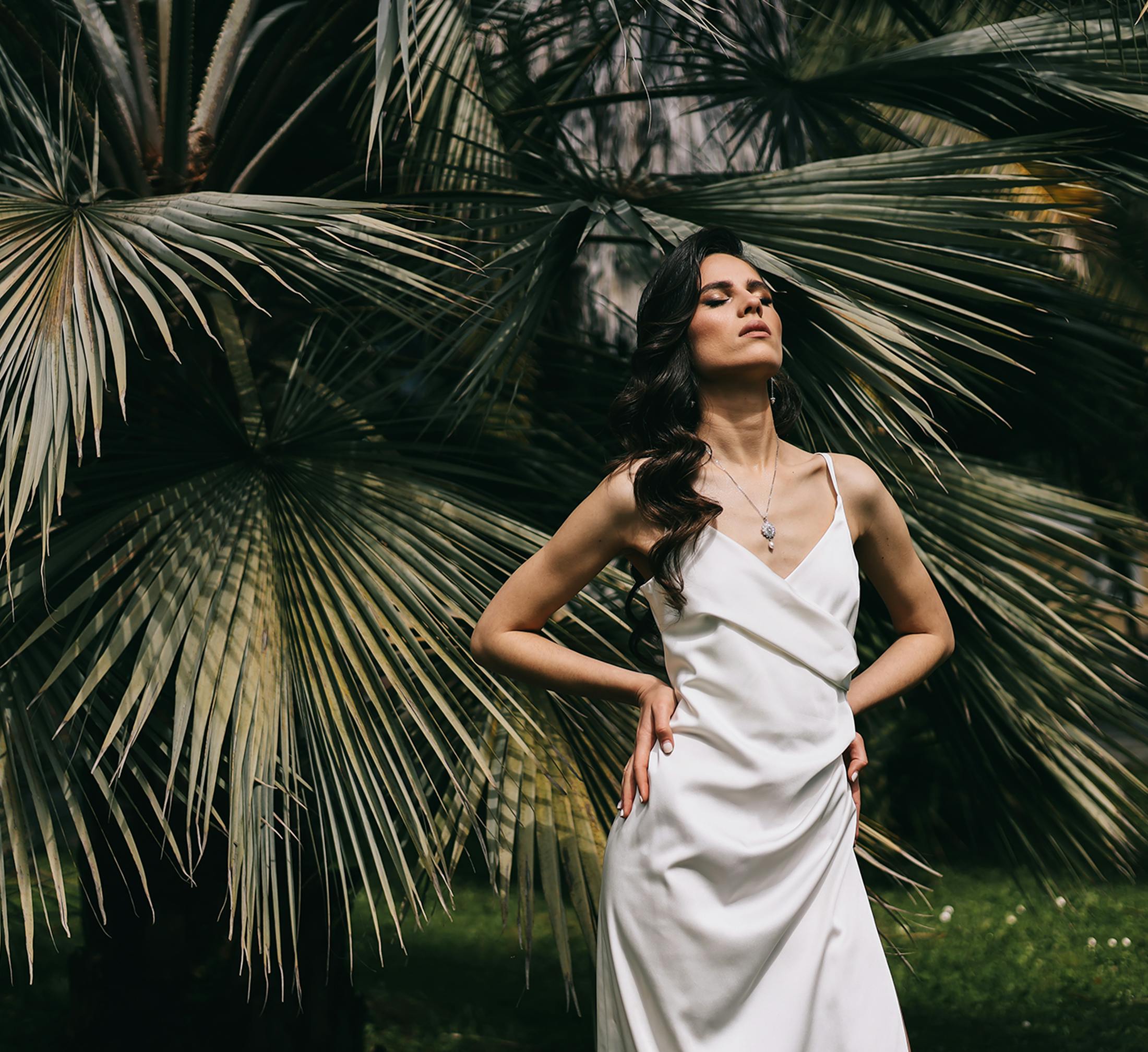 Woman standing with her hands on her hips