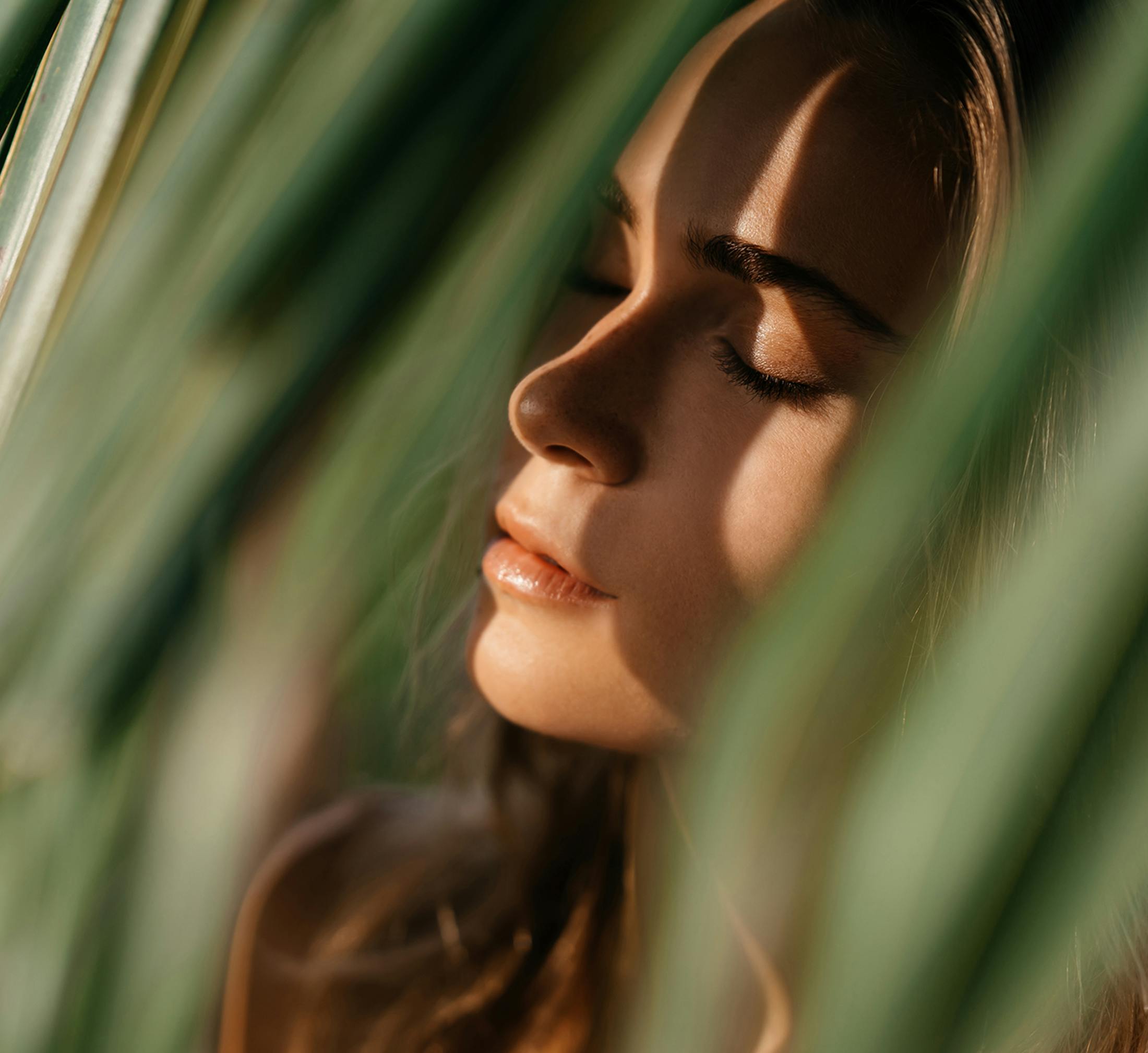 Woman with her eyes closed