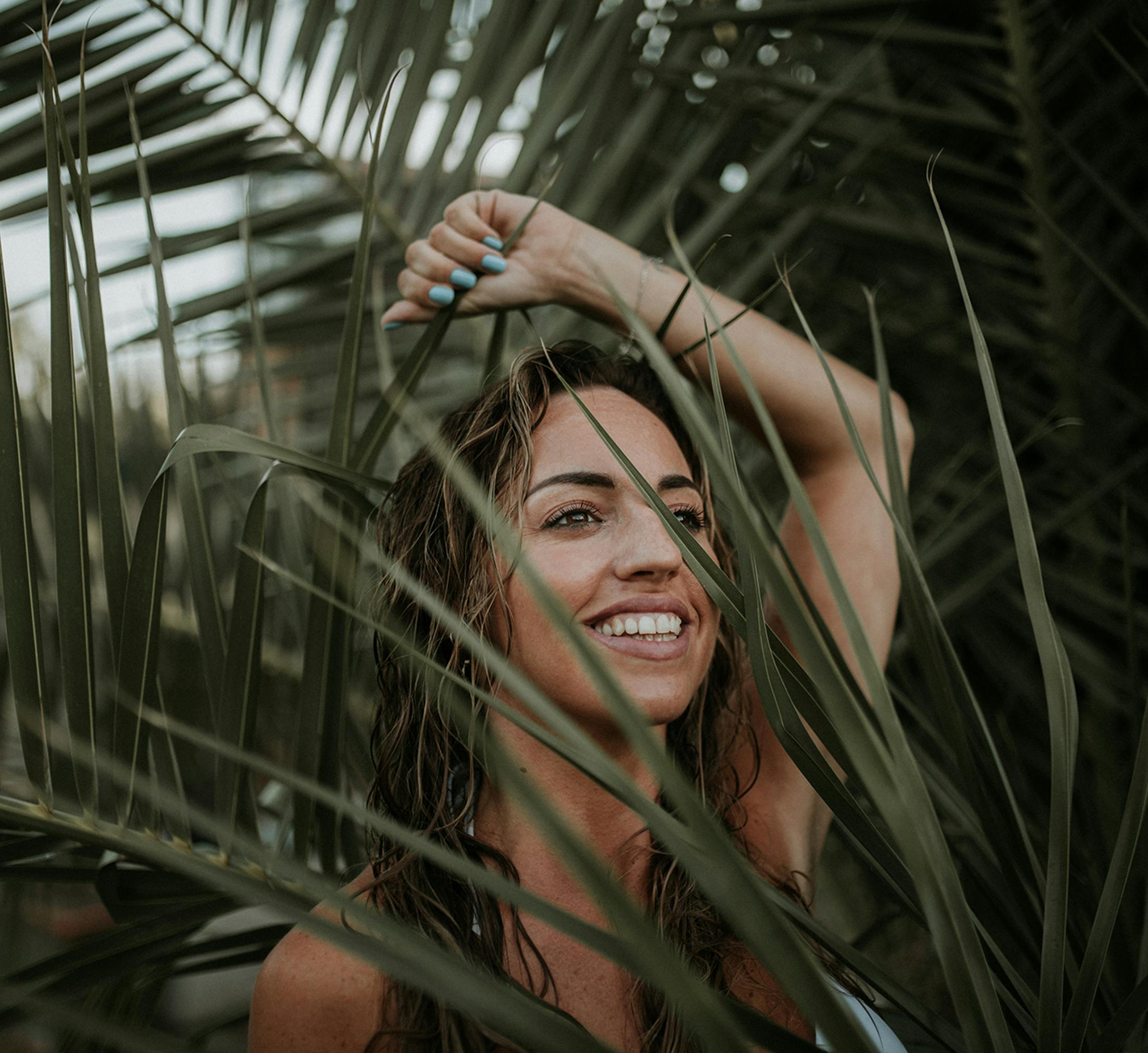 Woman with her hand above her head