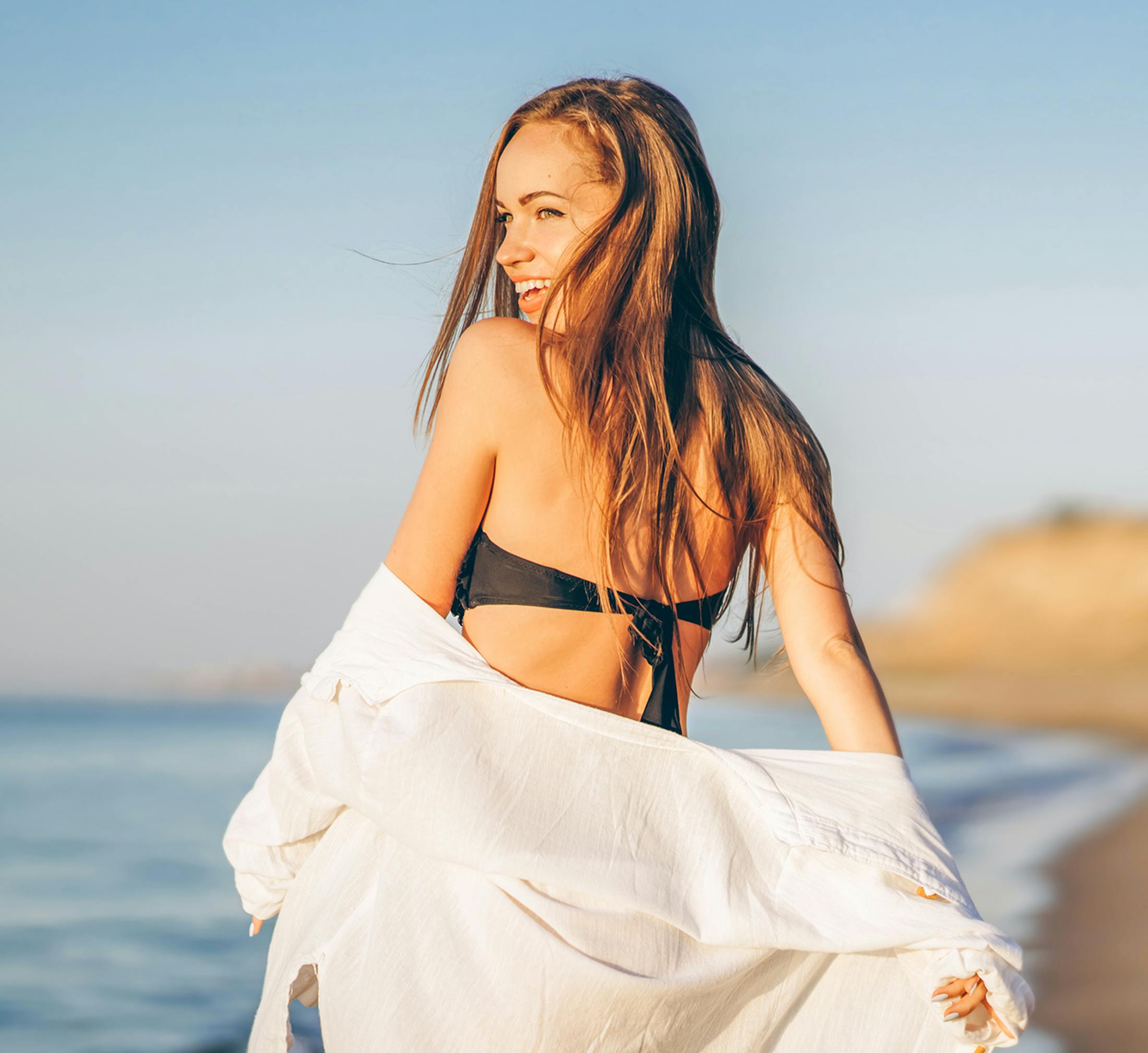 Woman looking over her shoulder