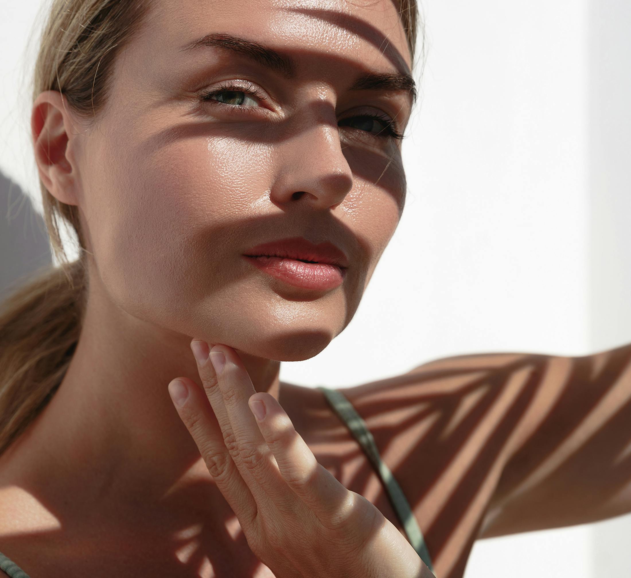 Woman touching her chin