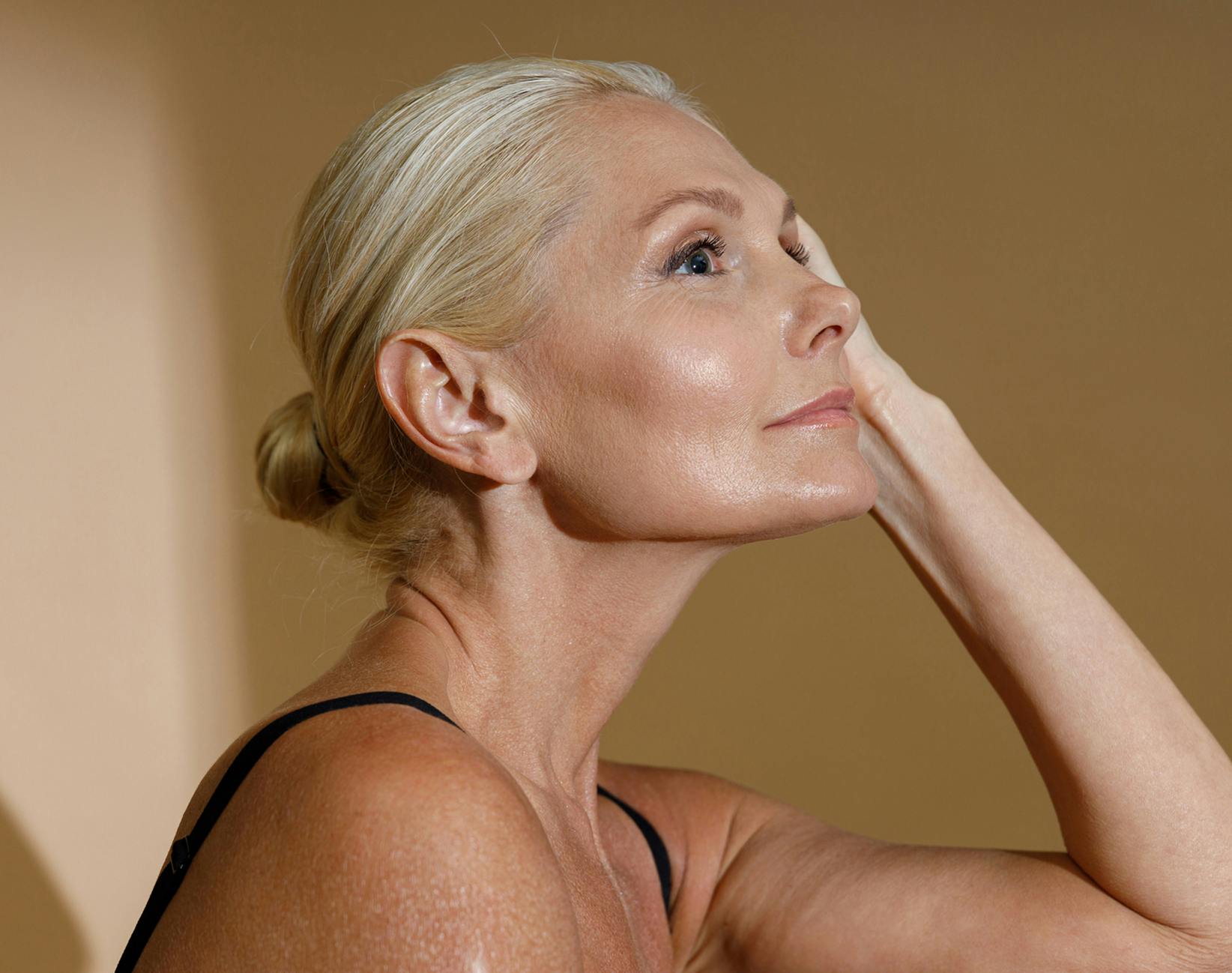 woman touching her face