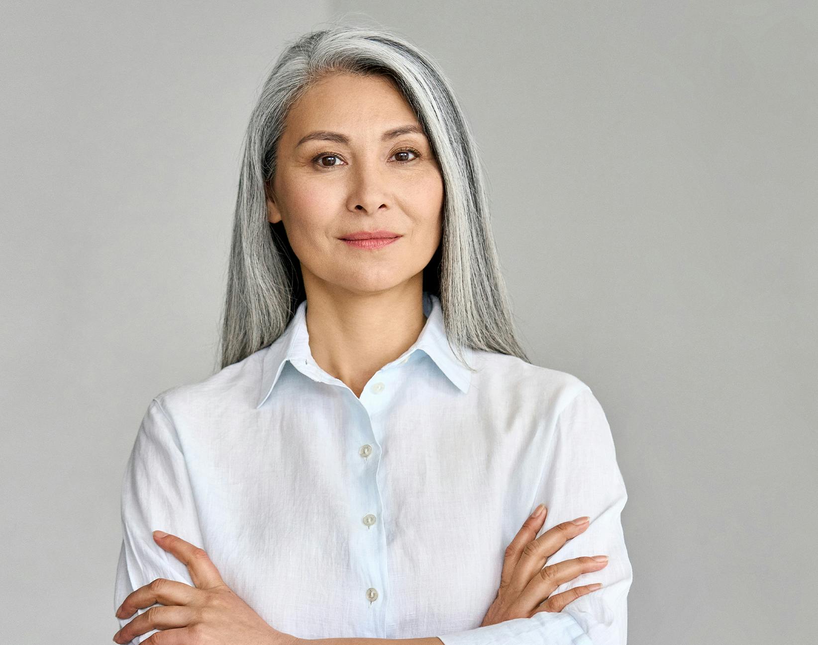 older woman crossing her arms