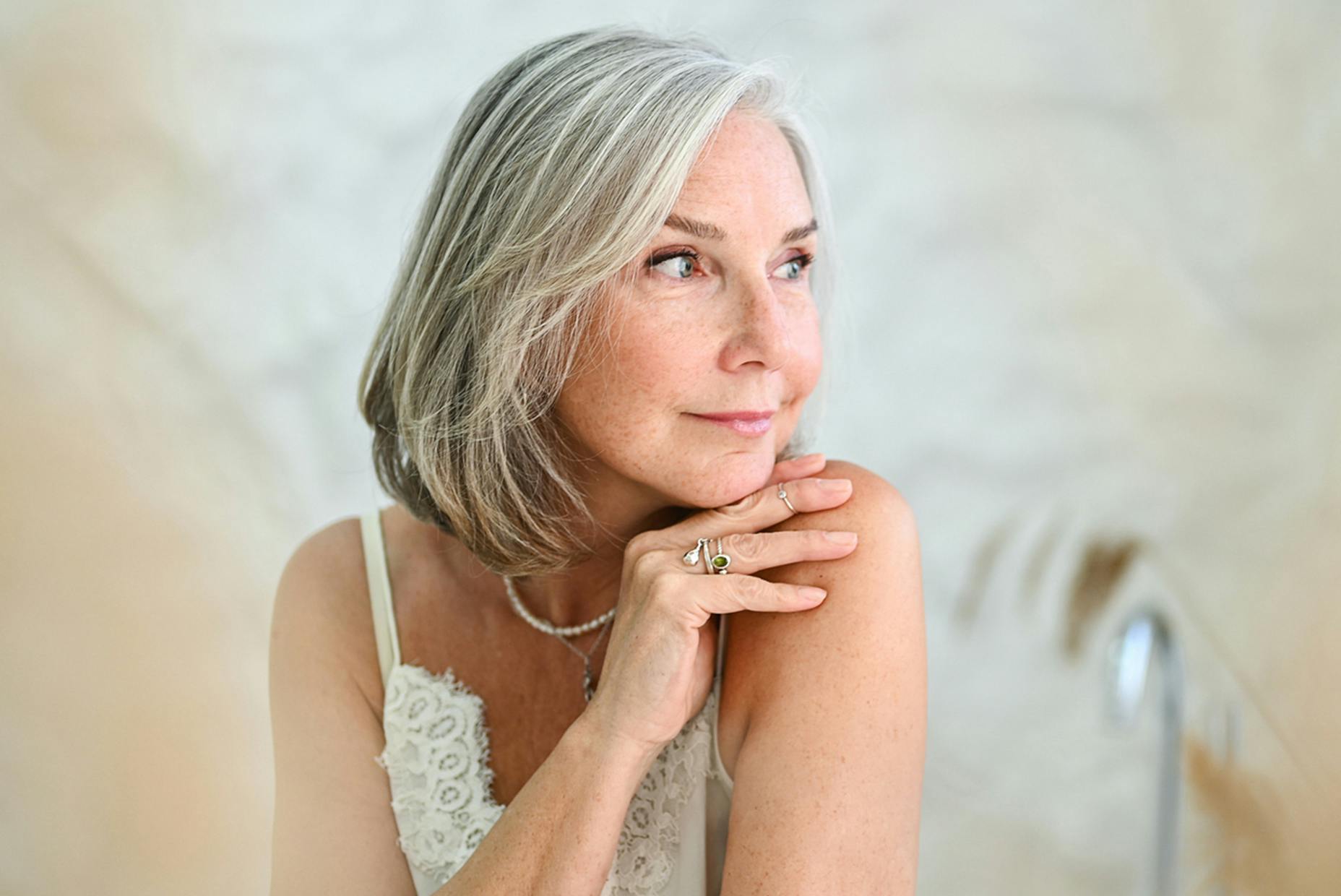 older woman looking over her shoulder
