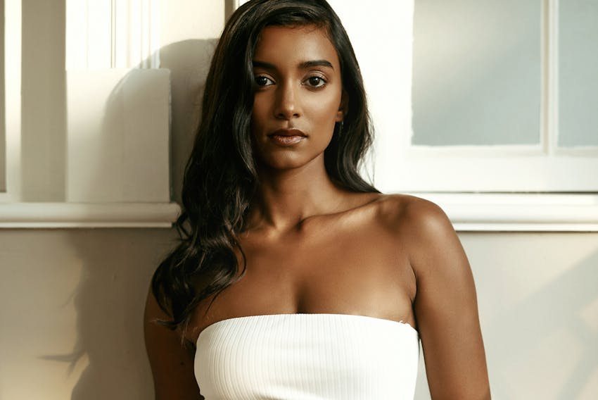 woman in white strapless top