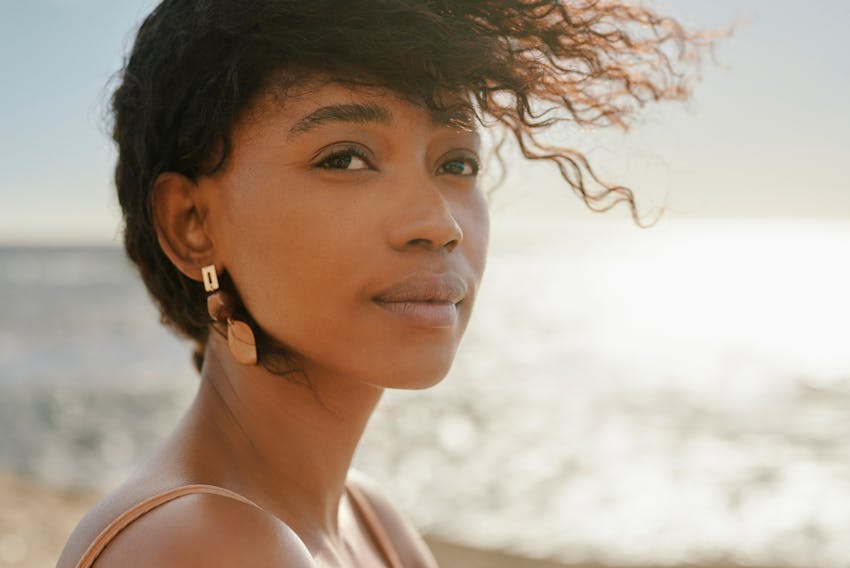woman standing on a beach