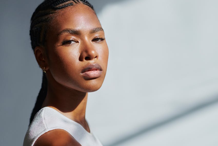 woman looking over her shoulder