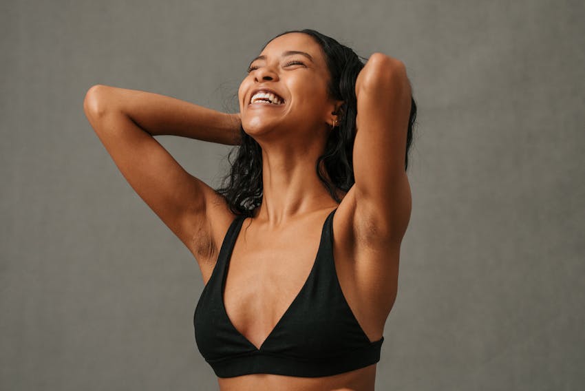 woman smiling looking up