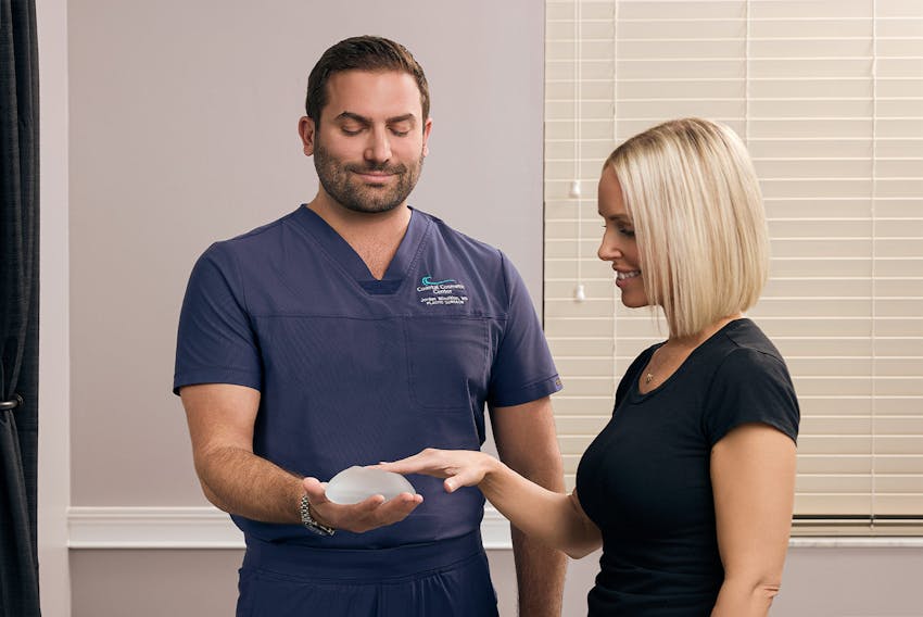 doctor and patient speaking about breast implants