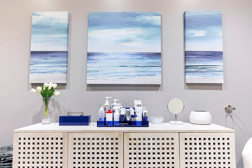 woman smiling holding a form