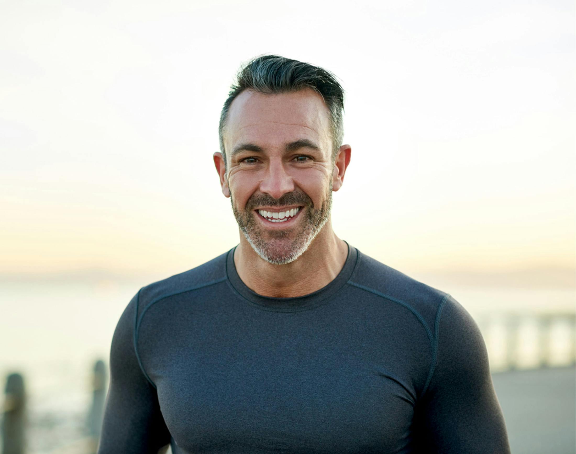 man in a long sleeve workout shirt