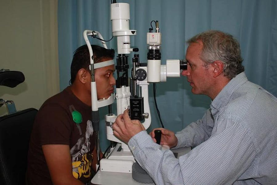 Doctor looking at patient