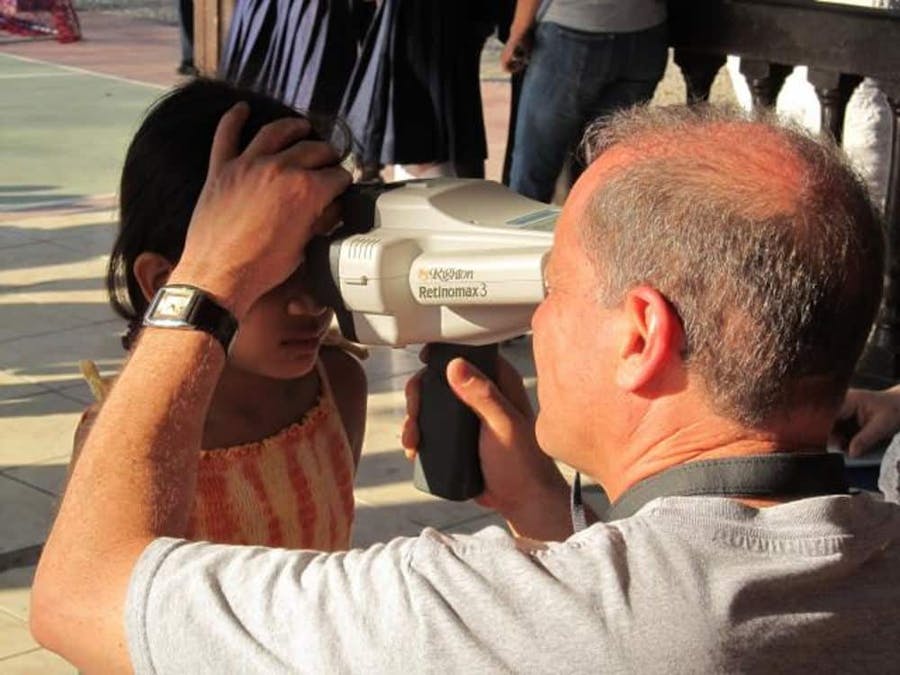 doctor giving eye test