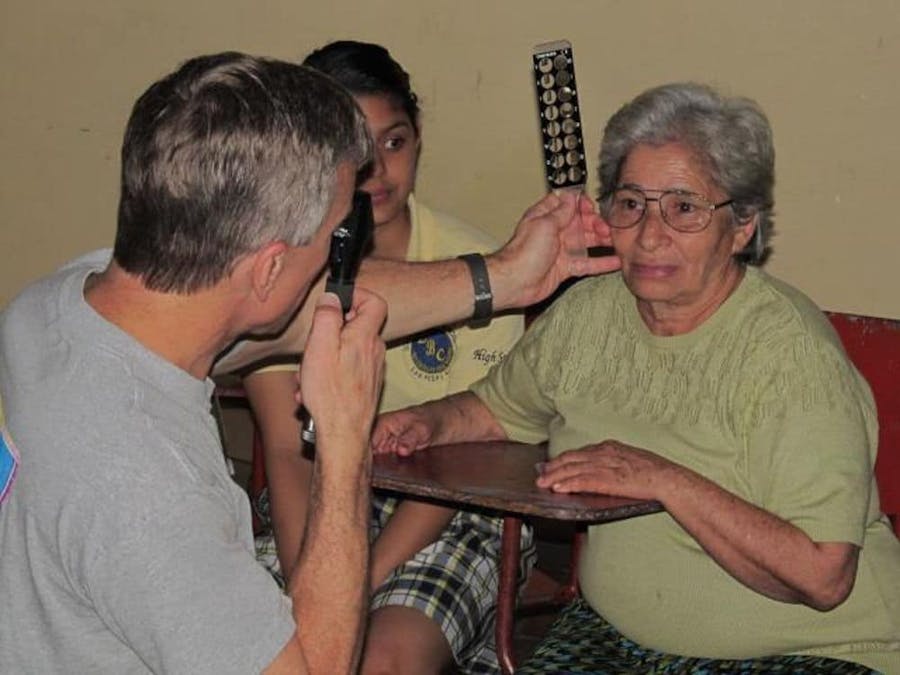 doctor giving eye test