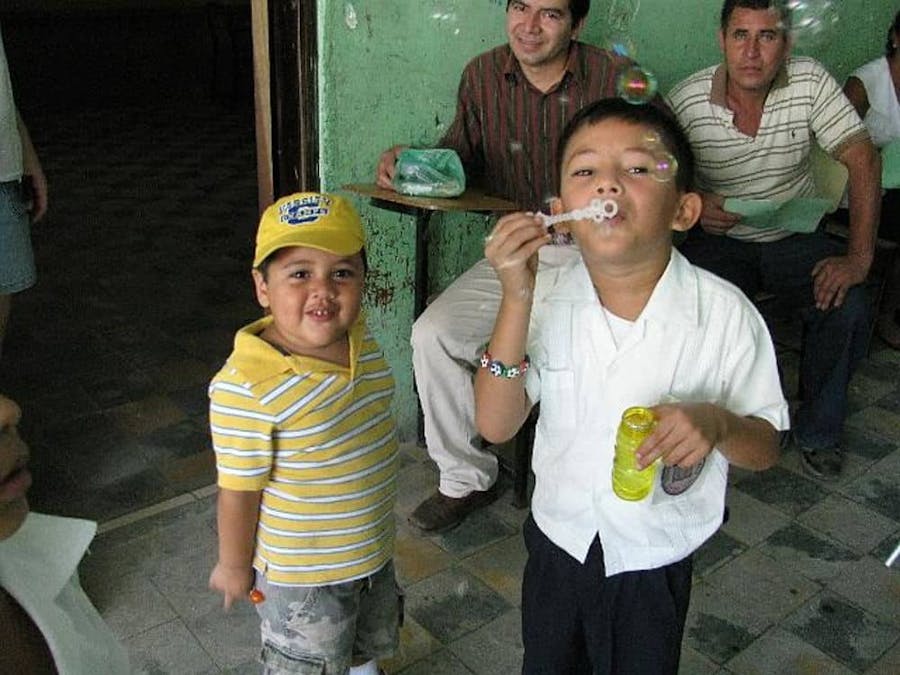 kids blowing bubbles