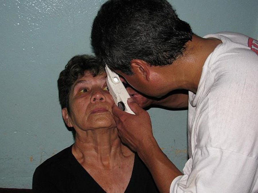 doctor giving eye test