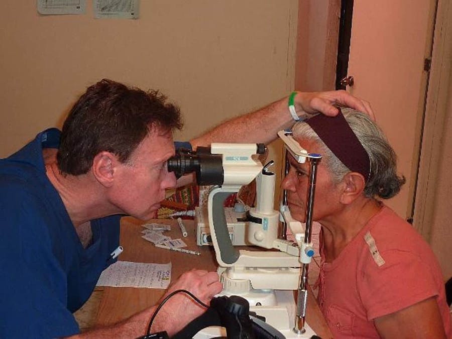 doctor giving eye test