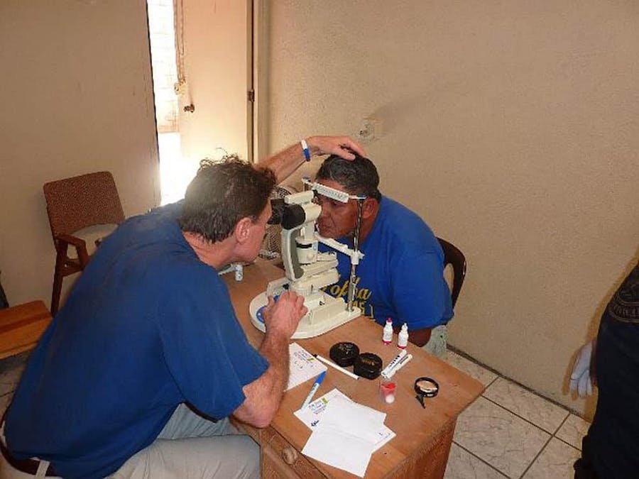 doctor giving eye test