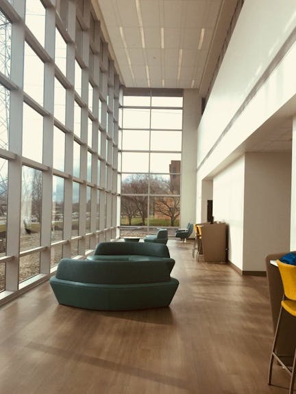 beautiful living room with a window wall