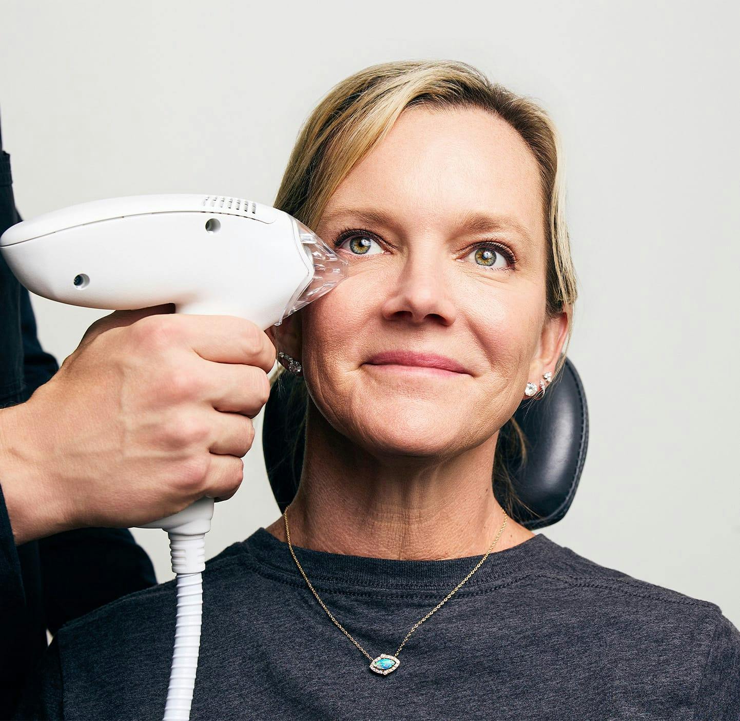 doctor looking through a machine