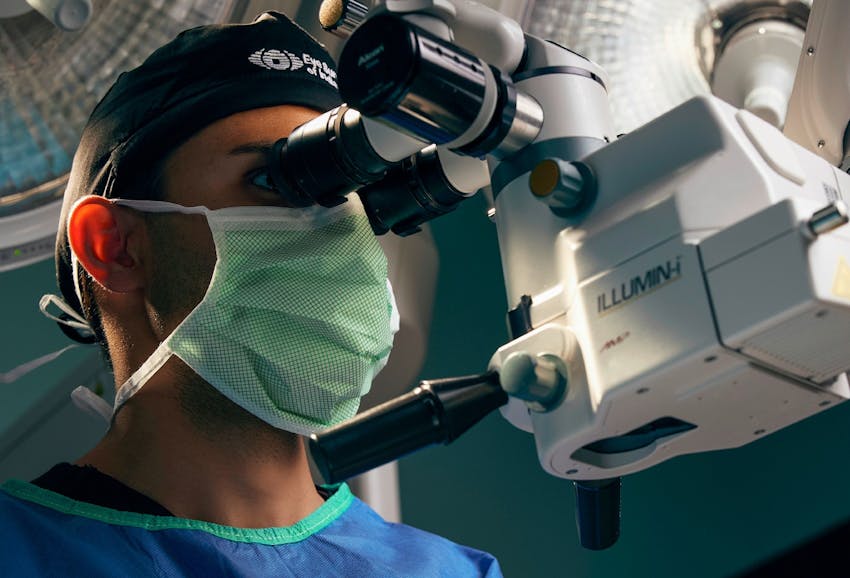 doctor checking someones eyes