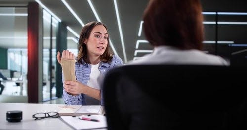 client talking to a lawyer
