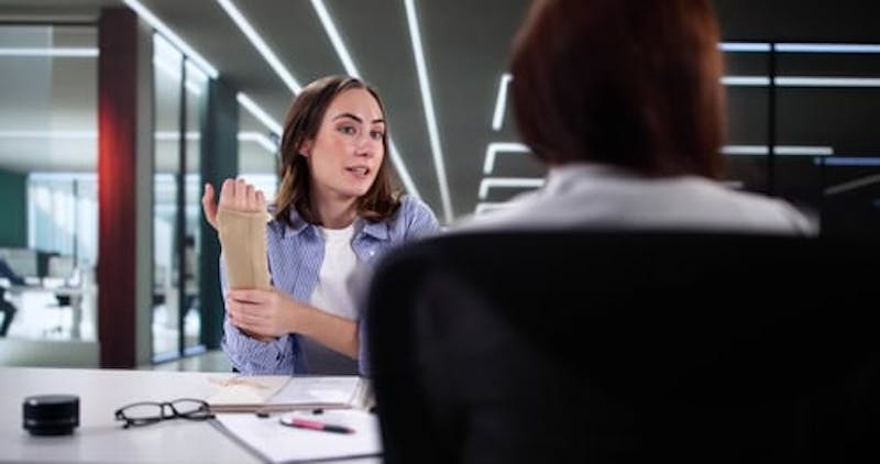 client talking to a lawyer