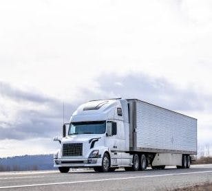 A white 18-wheeler truck