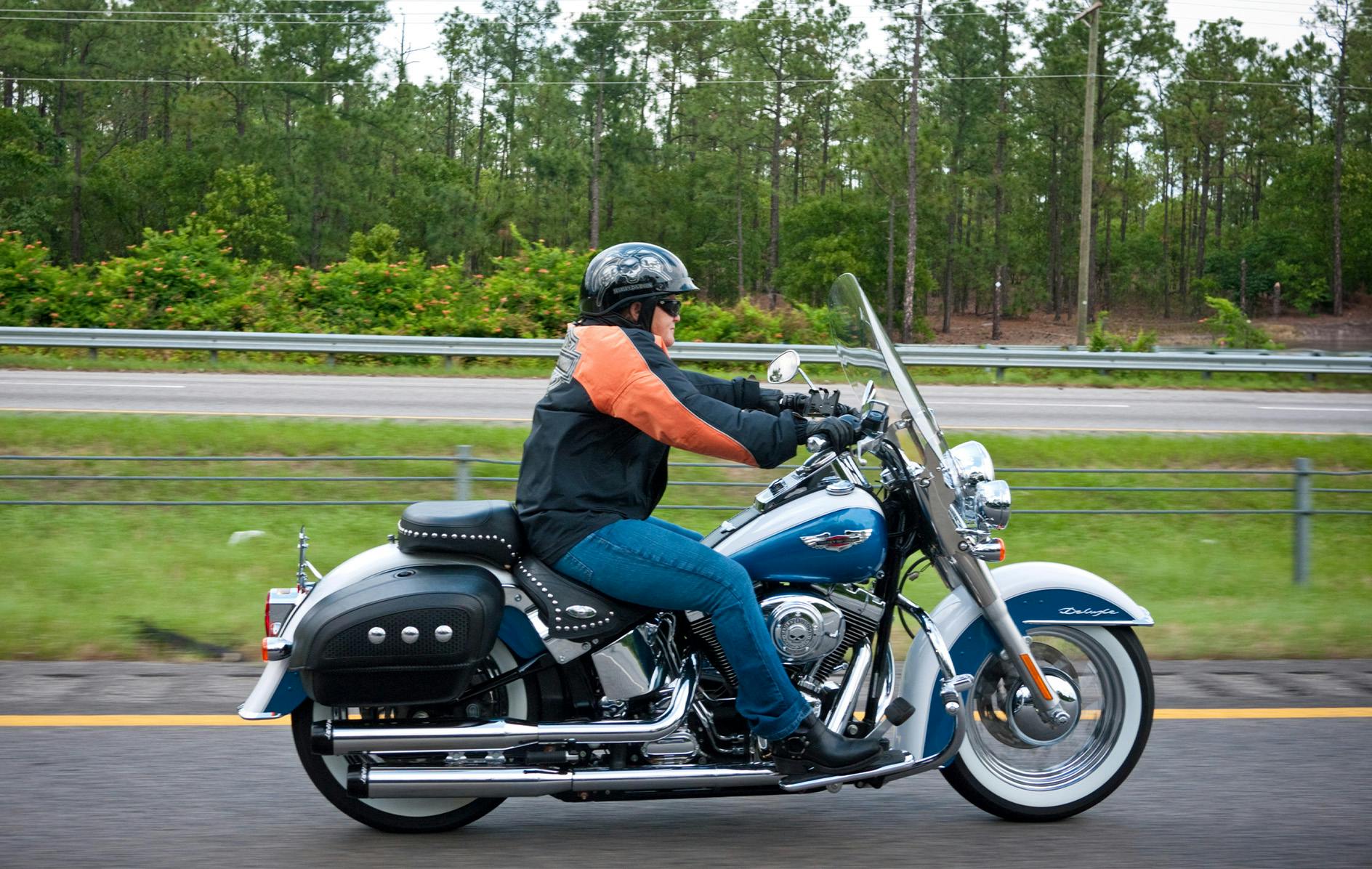 man driving a motorcycle